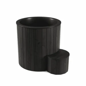 High-quality black cold plunge tub for cold water therapy, ideal for post-workout recovery, circulation improvement, and energy boost. Black thermo wood exterior, glassfiber interior in black, customizable add-ons like insulated cover, water cooler-heater, LED lights, and digital thermometer. Compact size for 1 person with 1015 mm outer diameter and 910 mm depth. Perfect for elevating your wellness routine