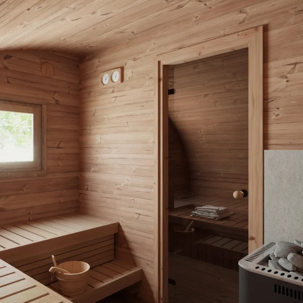 Steam room inside the Ilmarinen sauna, featuring double-tier wooden benches, a wooden bucket with ladle, and a Harvia stove, ideal for a traditional sauna experience.