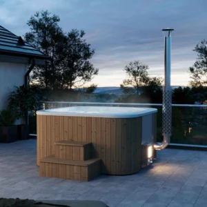 "Icon 205" hot tub with an ergonomic fiberglass insert and thermowood walls, ideal for six people. Features include an AIS 304 stainless steel heater and a 2-meter chimney with a protective grille.